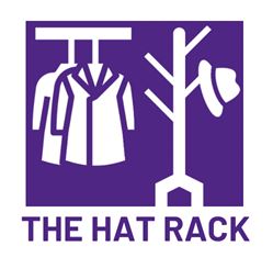 hat rack with hat and white physician coats